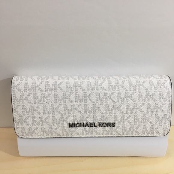 Michael Kors Handbags - MIcheal Kors Tri Fold Jet Set